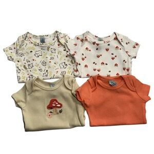 Cozy Cuties: Adorable Baby Onesies Set 🍄